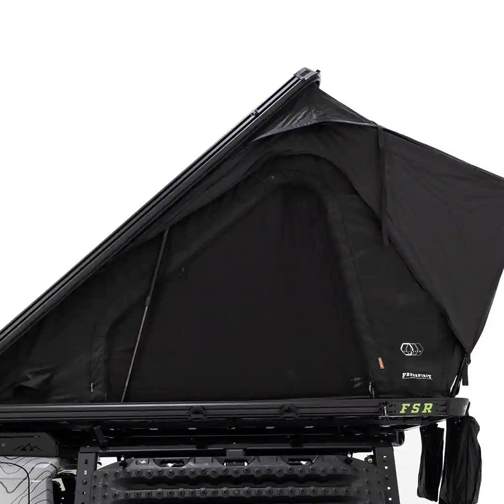 Side profile, close up photo of FSR Aspen Pro Standard roof top tent from Freespirit Recreation mounted on the bed of a short bed Toyota Tacoma pickup.