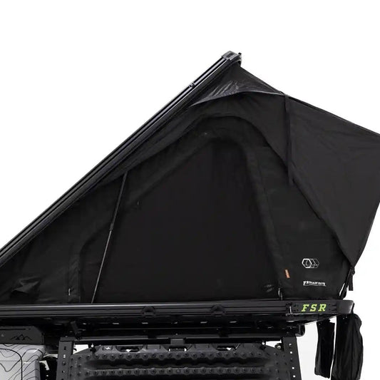 Side profile, close up photo of FSR Aspen Pro Standard roof top tent from Freespirit Recreation mounted on the bed of a short bed Toyota Tacoma pickup.