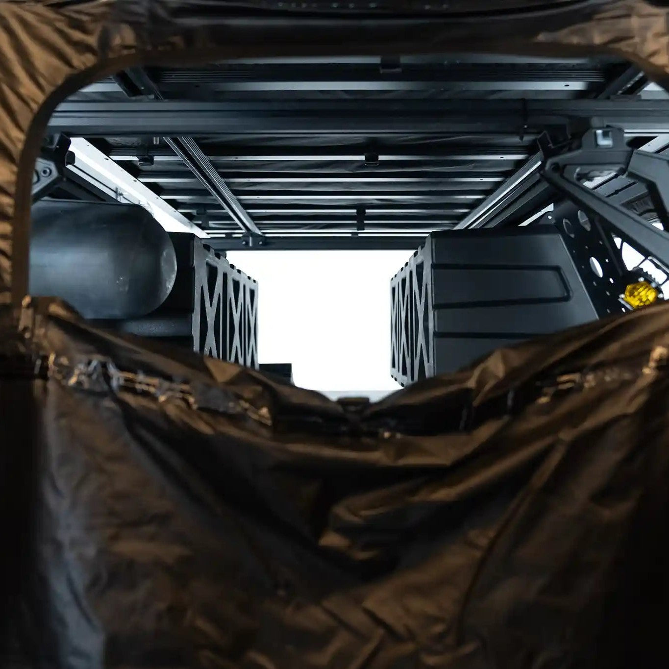 Interior view looking through the window of the FSR Shower Awning for camping and overlanding