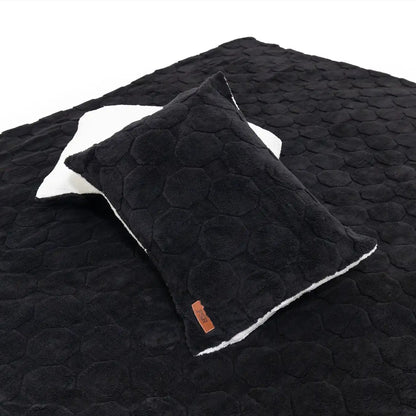 Close up of the quilted fabric of the FSR Cloud Comforter and Pillow Cases in the Rooftop Tent Bedding Set