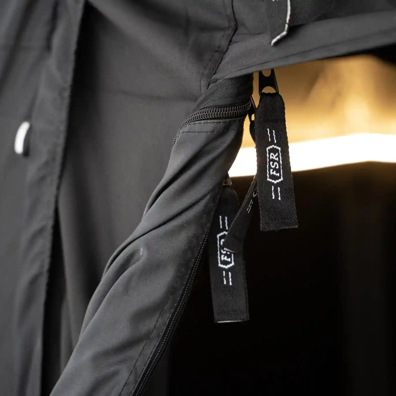 Close-up of the zippers and fabric of the FSR 4XL Tent Car Connect car camping attachment