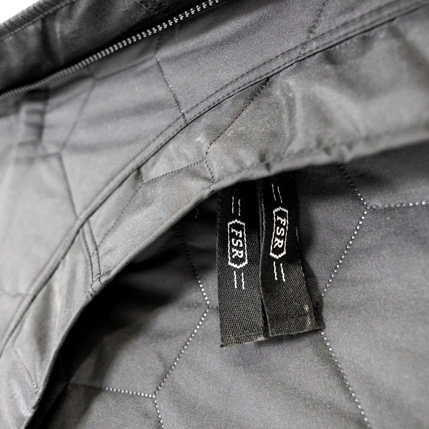 Close up of the branded zipper on the FSR Hub 6XL Tent pop up 6 Person family camping and glamping tent from Freespirit Recreation