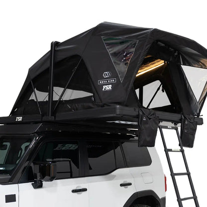 Close-up exterior photo of the Nova King rooftop tent mounted with the interior LED tent lights on.