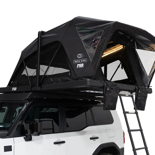 Close-up exterior photo of the Nova King rooftop tent mounted with the interior LED tent lights on.
