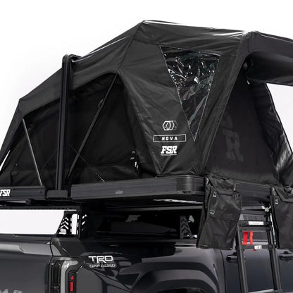 Photo of FSR Nova rooftop tent deployed on the rear of a 2025 Toyota Tacoma with all the doors and windows closed.