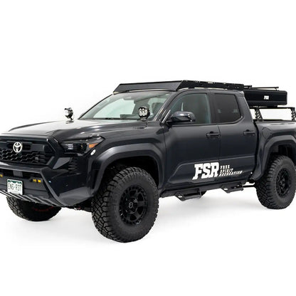 Photo of FSR Nova Standard Tri-Layer rooftop tent closed on the rear of a black 2025 Toyota Tacoma.