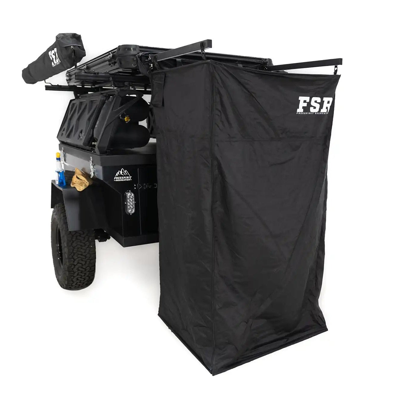 Image of the open FSR Shower Awning from Freespirit Recreation mounted to the back of an overland trailer to use as a camping shower and bathroom tent