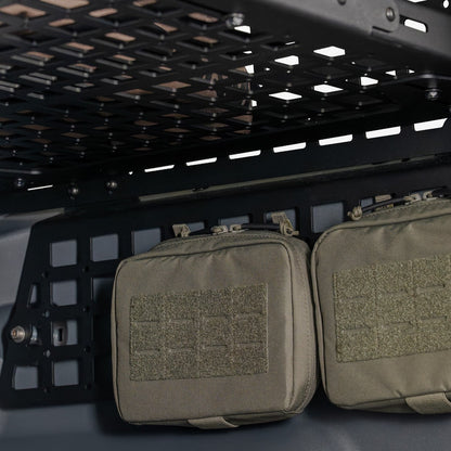 Pouches mounted to the Rear Window Molle Storage Panels for the 2023-2026 INEOS Grenadier