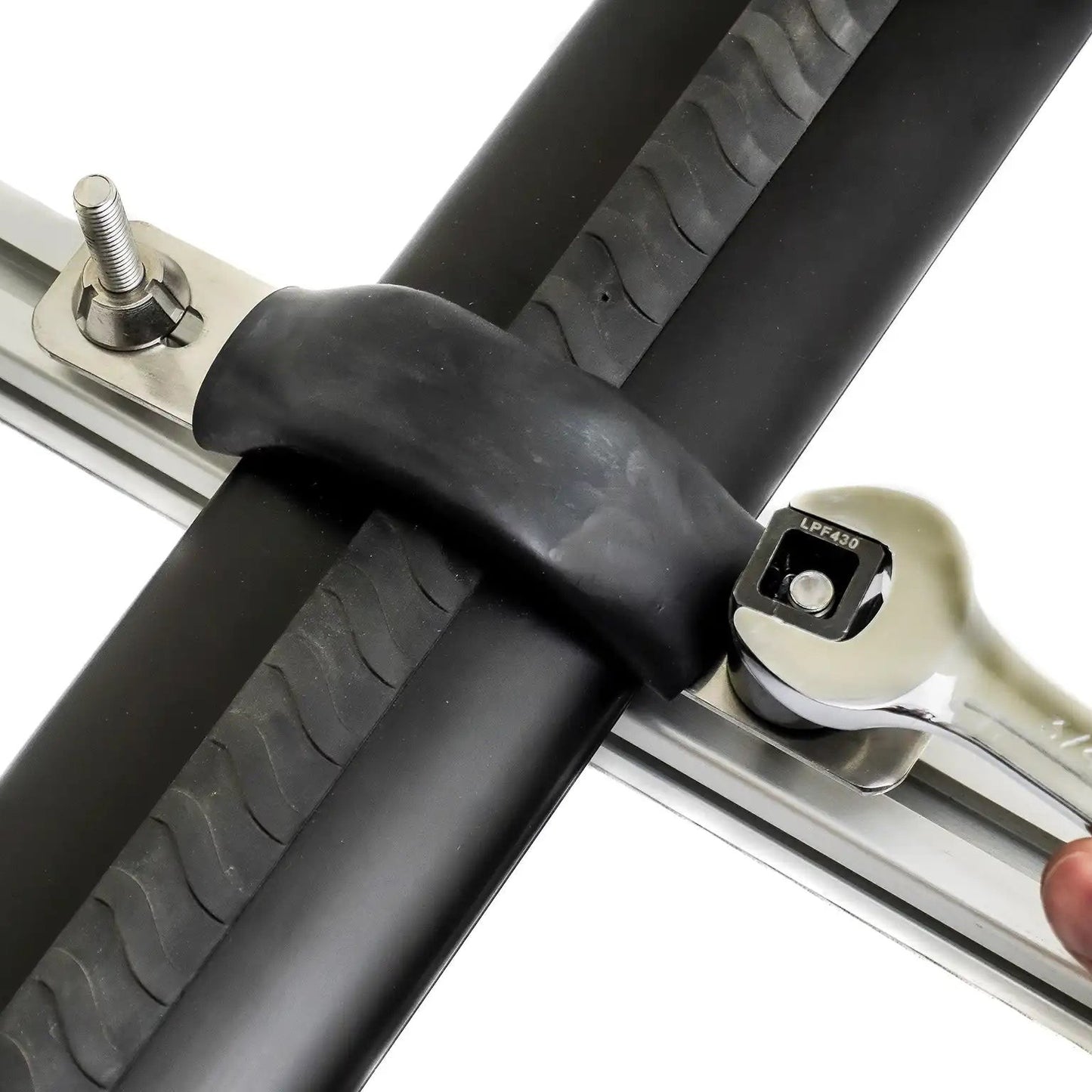 Close-up of a person using a wrench and the specialty security nut tool to install the FSR M8 Security Nuts