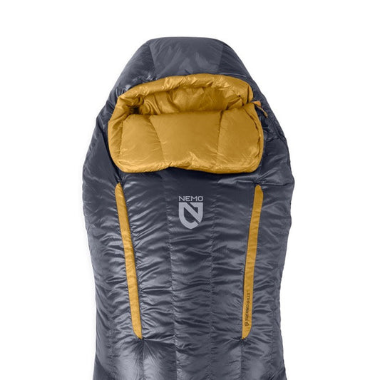 The NEMO Equipment Disco™ Men's Endless Promise® Down Sleeping Bag offers side-sleeping comfort, an integrated insulated pillow, and two yellow Thermo Gill vents for adjustable airflow.