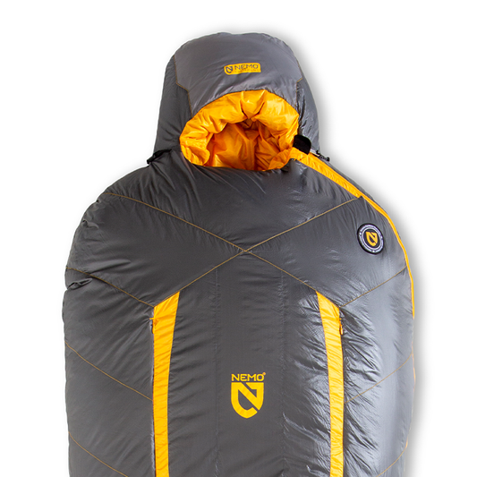 A gray and yellow NEMO Equipment Sonic™ Down Mummy Sleeping Bag with a hood, featuring 800-fill down for warmth, is displayed upright against a white background.