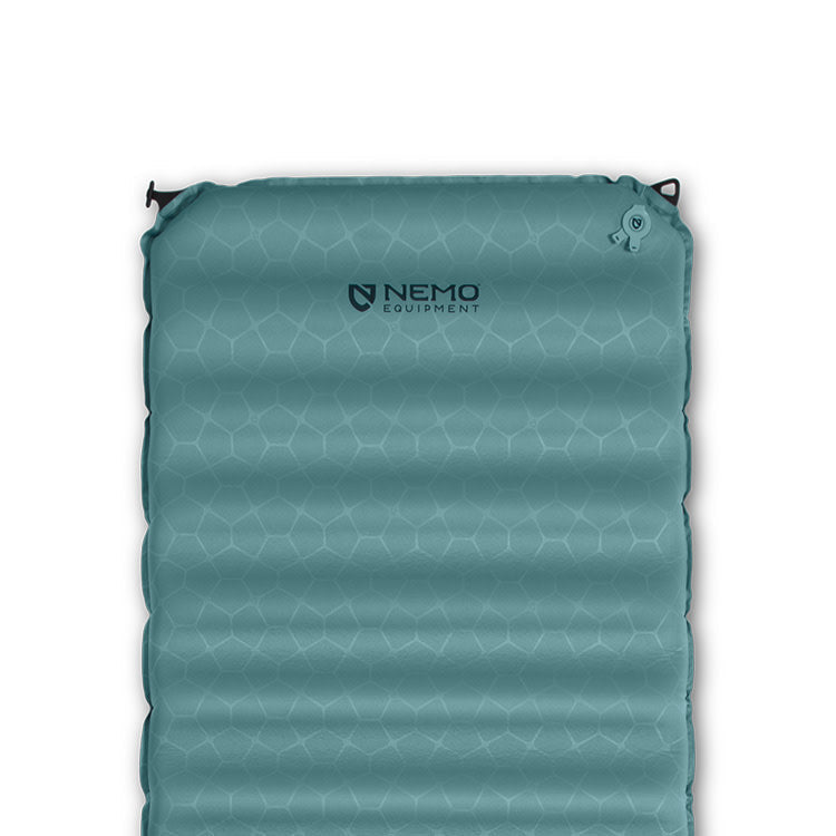 The NEMO Equipment Flyer™ Cloud Self-Inflating Sleeping Pad, featuring a teal hexagonal pattern, is perfect for backcountry camping and is shown here on a white background.