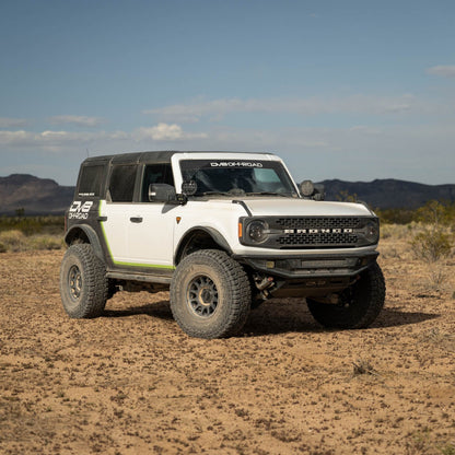 White Bronco with off road parts in a desert landscape