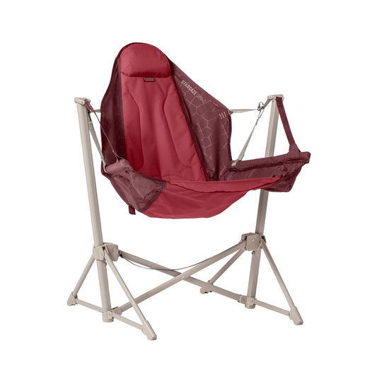 The NEMO Equipment Stargaze™ EVO-X Folding Reclining Camp Chair is a luxury portable outdoor chair with a red fabric seat and backrest, supported by a beige metal frame, perfect for camping.