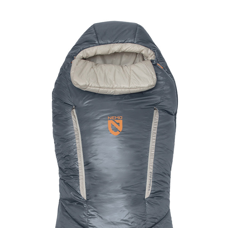 The Forte™ Endless Promise® Men's Synthetic Sleeping Bag by NEMO Equipment is gray with a hood and two vertical zippers, featuring the NEMO logo—ideal for backcountry adventures.