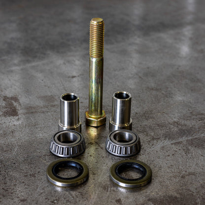 Close up view of all the components of the C4 swing arm bearing rebuild kit.