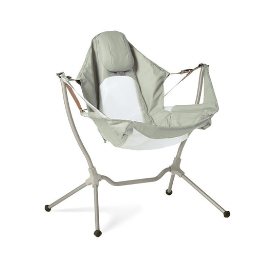 The NEMO Equipment Stargaze™ Reclining Camp Chair features a modern design with a light gray fabric seat, metal frame, supportive headrest, and four sturdy legs, pictured against a white background.