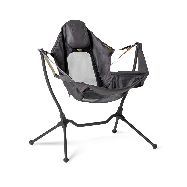The NEMO Equipment Stargaze™ Reclining Camp Chair is a black and gray folding chair with a fabric sling seat, arm supports, and headrest for a hammock-like experience.