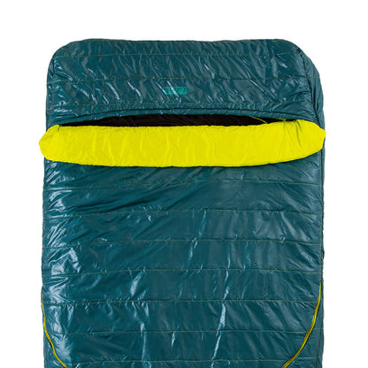 The NEMO Equipment Jazz™ Double Synthetic Sleeping Bag is displayed in teal and yellow, laid flat with its top portion open to reveal the spacious interior.