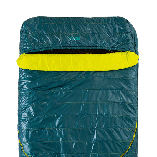 The NEMO Equipment Jazz™ Double Synthetic Sleeping Bag is displayed in teal and yellow, laid flat with its top portion open to reveal the spacious interior.